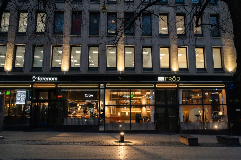 A well-lit commercial property with rental space in evening light